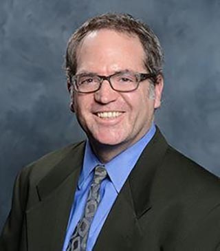 ROBERT ARNETT, M.D.